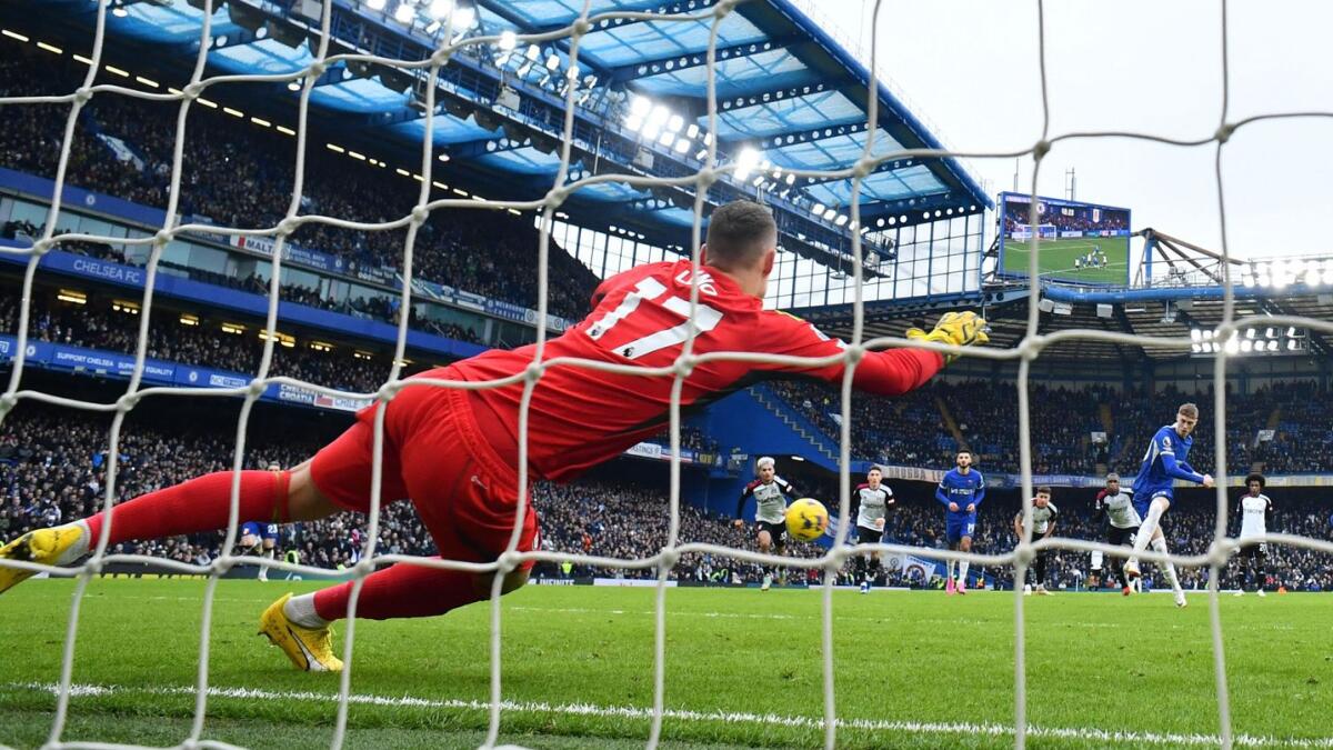Chelsea's Cole Palmer scores their first goal from the penalty spot past Fulham's Bernd Leno. - Reuters