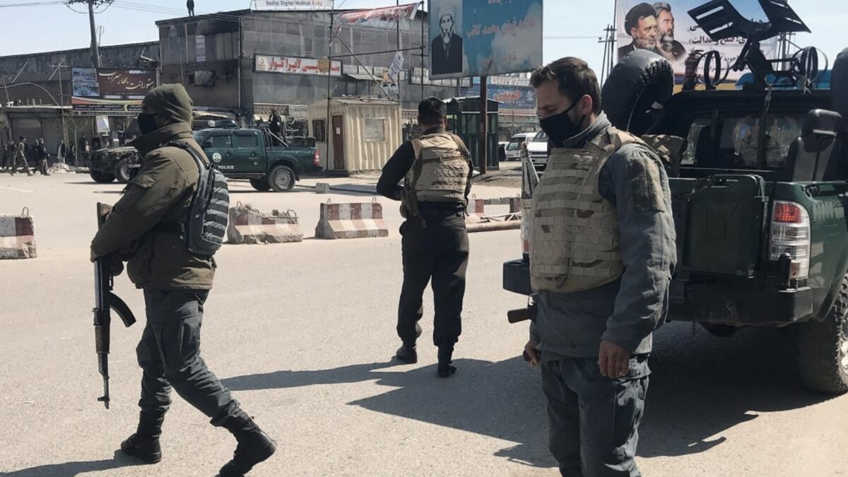 Blast, gunfire rock downtown Kabul in attack near ministry 