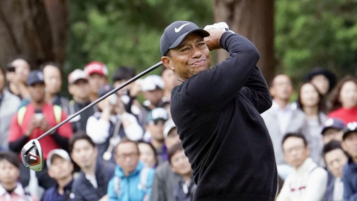 Woods shoots six-under-par 64 to share first-round lead in Japan