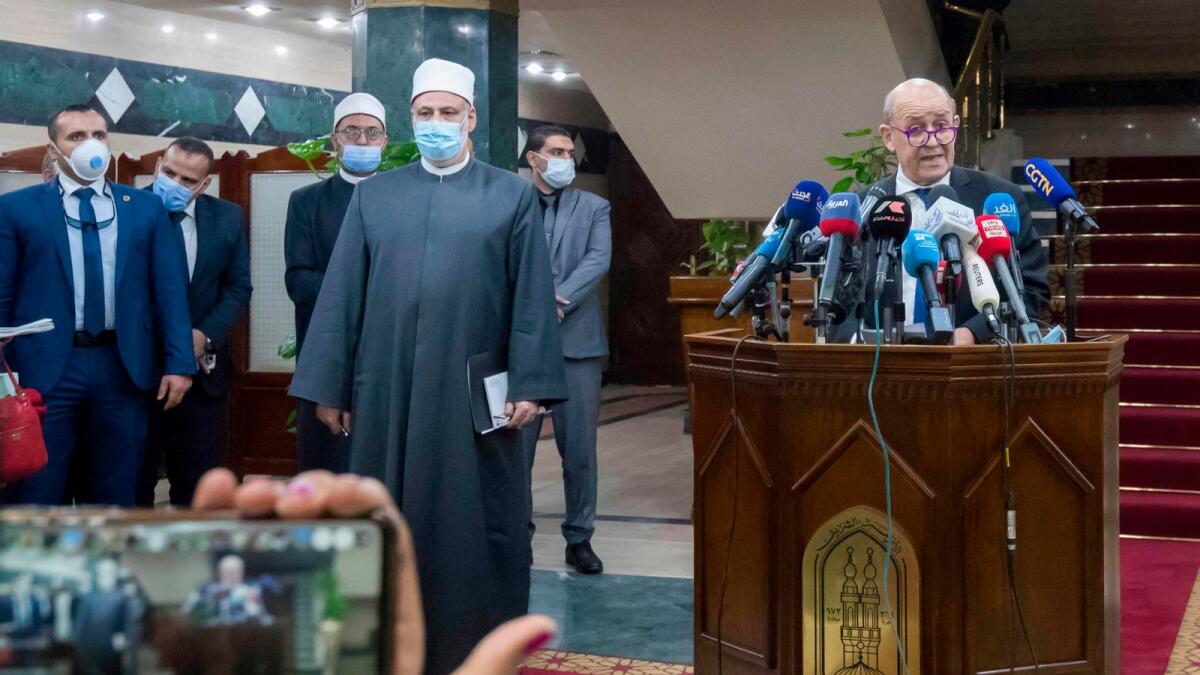 French Foreign Minister Jean-Yves Le Drian delivers a speech following a meeting with the Grand Imam of Al Azhar in Cairo on Sunday.