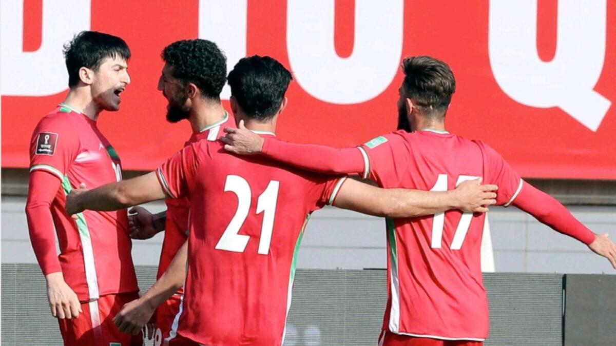 Iran's players celebrate scoring during the 2022 Qatar World Cup Asian Qualifiers football match between Iran and Lebanon, at the Imam Reza Stadium in the city of Mashhad. — AFP