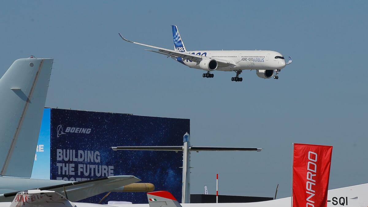 An Airbus A 350 performs his demonstration flight at Paris Air Show. The number of A350s grounded by Qatar because of surface damage has risen to 28 out of 53 A350s in its fleet. — AP file photo