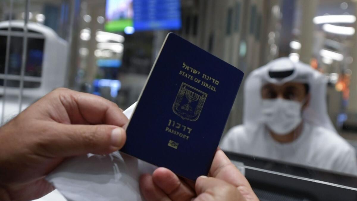 An Israeli traveller presents his passport upon arrival at the Dubai airport on November 26, when flydubai's first commercial flight from Tel Aviv landed in the emirate.   (AFP file photo used for illustrative purpose)
