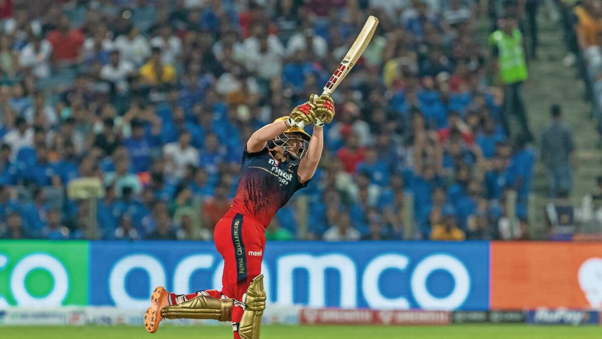 Anuj Rawat of Royal Challengers Bangalore plays a shot against Mumbai Indians in Pune on Saturday night. — BCCI