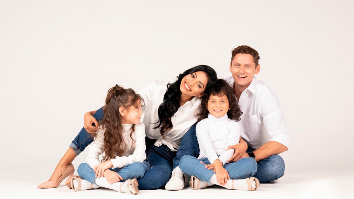 Debanjali Kamstra with husband Christiaan Kamstra and kids Tiffany and Victoria Kamstra