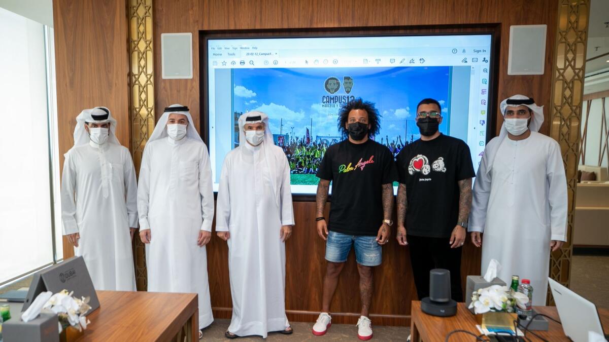Real Madrid star Marcelo (in shorts) with DSC officials in Dubai. — Supplied photo