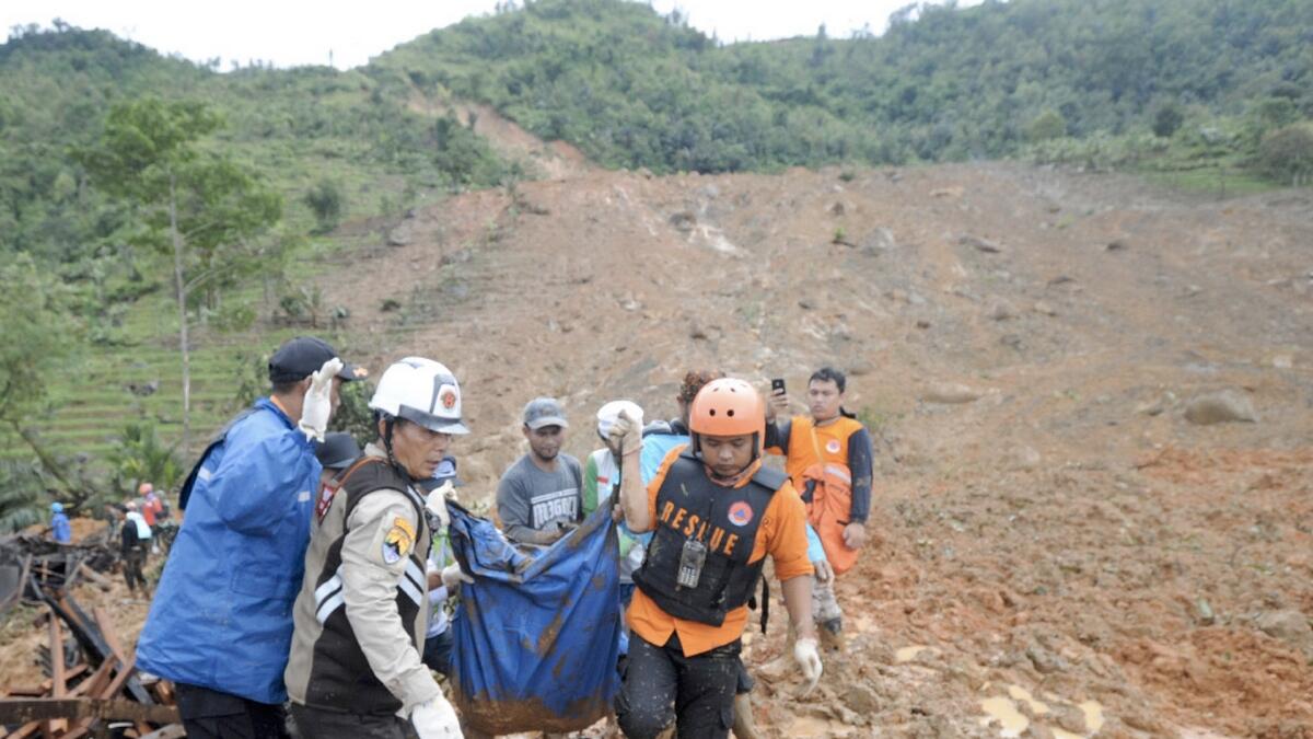  Rain sets off Indonesia landslide, killing 9 with 34 missing