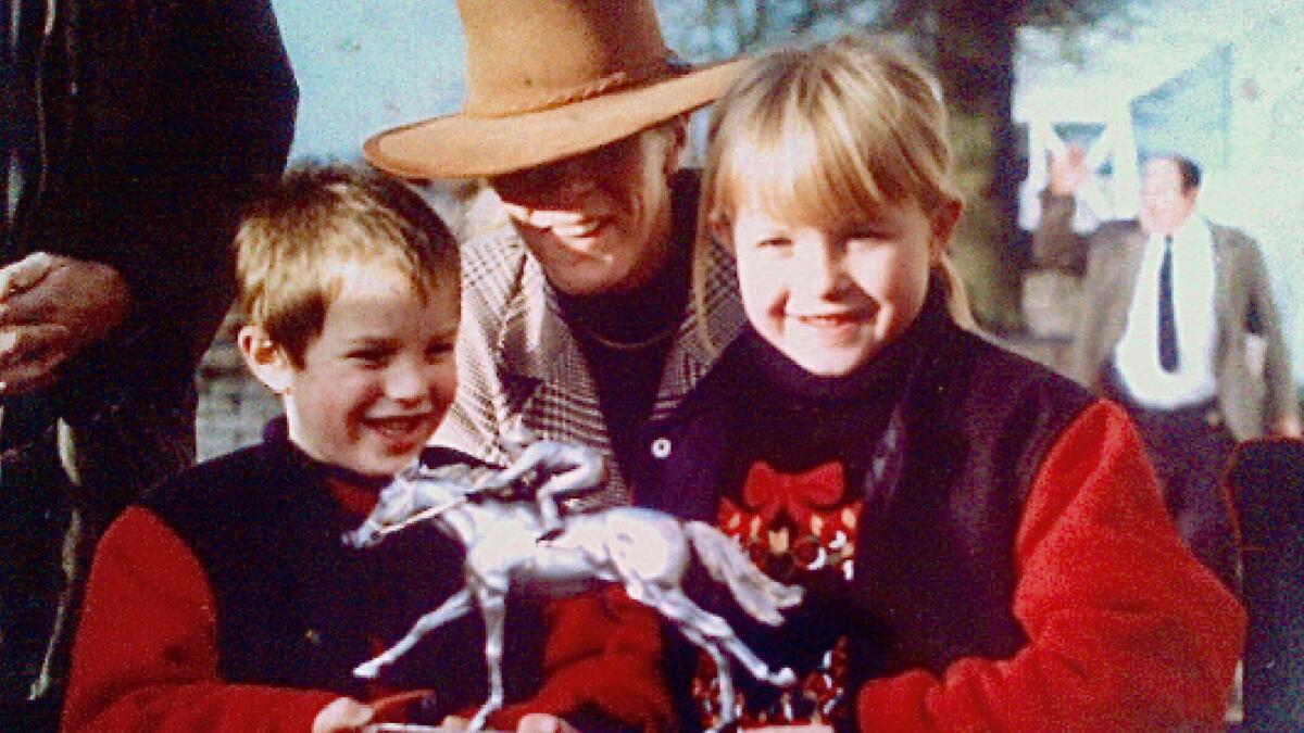 World renowned jockeys James, above left, and Sophie, right, with their mother Jacquie in their formative years in the UK. (Supplied photo)