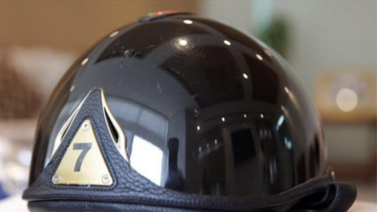 Royal helmet, number plate fetch Dh50m at auction