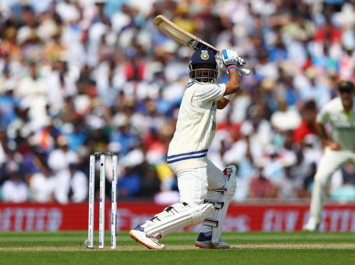 India's Ajinkya Rahane plays a shot. — Reuters