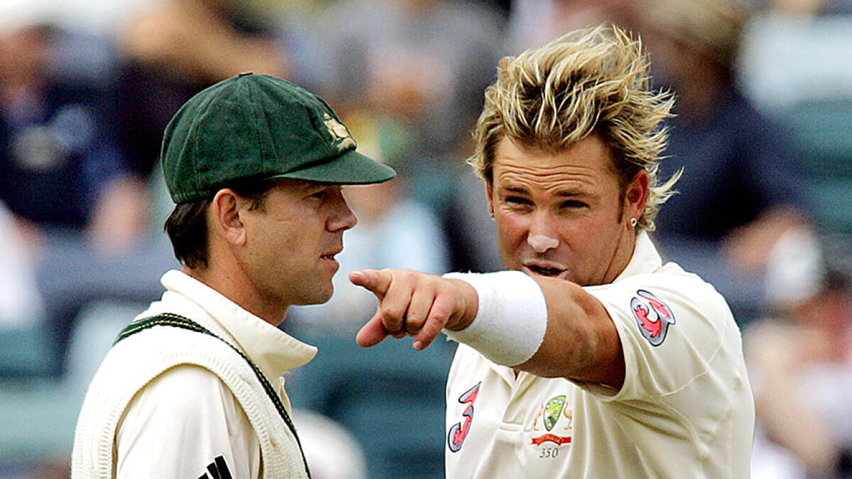 Shane Warne initiated the conversation by savaging Ricky Ponting (left) for his decision to bowl first in the second match of the series. -- AFP file