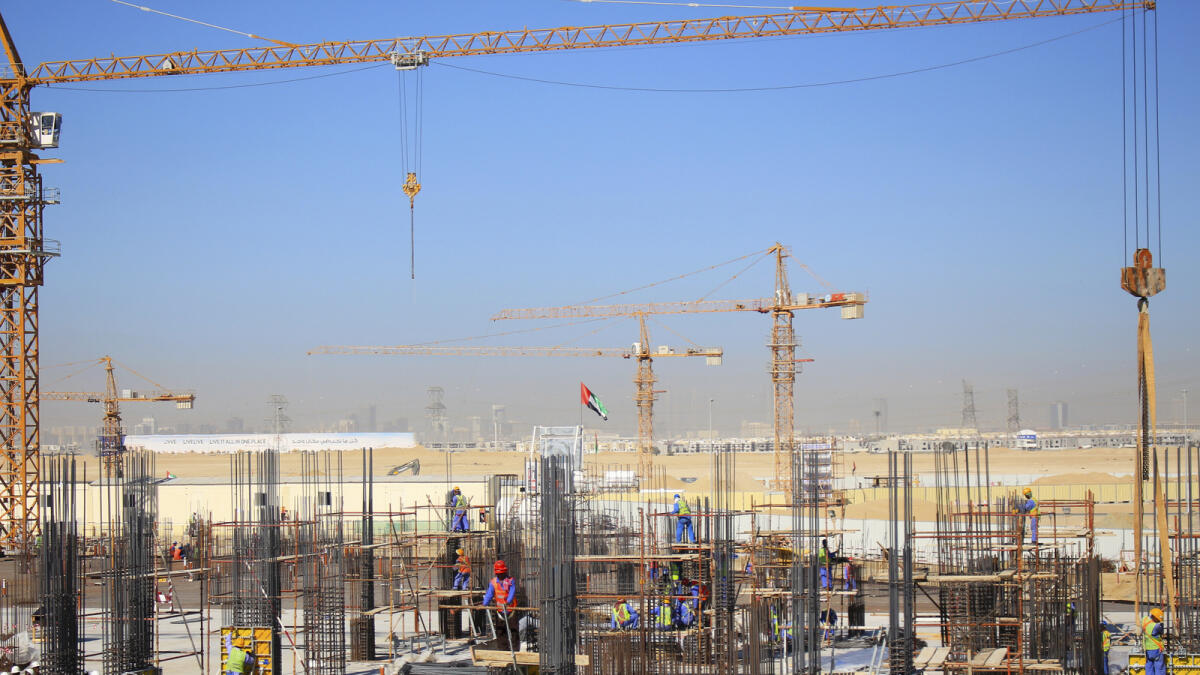 Construction work in full swing on the townhouses and apartments in Nshama's Town Square project in Dubai.