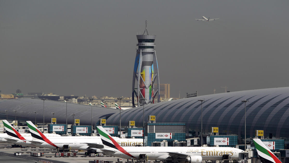 Emirates planes parked at Dubai airport. — File photo