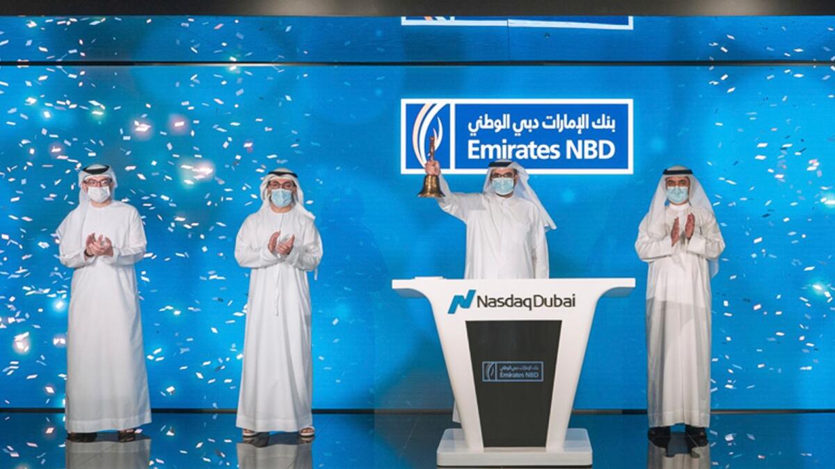 Hesham Abdulla Al Qassim and other senior delegates at market-opening bell at Nasdaq Dubai to celebrate listing of $750 million conventional bond. — Supplied photo