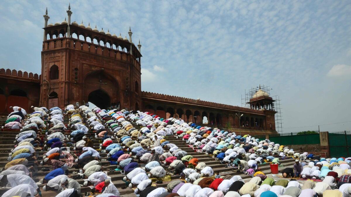 Muslims in India offer prayers on the last Friday of the holy month of Ramadan at the Jama Masjid mosque, ahead of  Eid Al Fitr, in New Delhi.