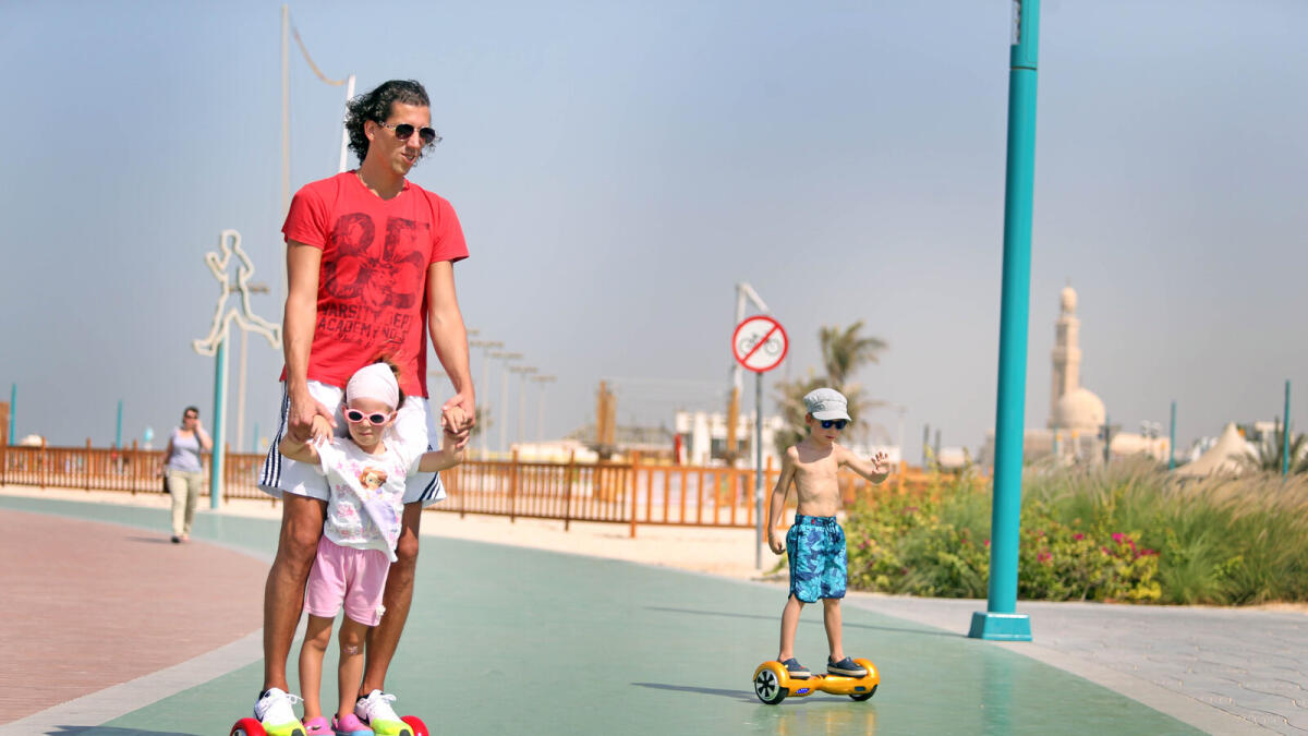 A family enjoys the afternoon while riding segway at the Kite Beach in Dubai. Photo by Dhes Handumon(FOR ILLUSTRATIVE PURPOSE ONLY)