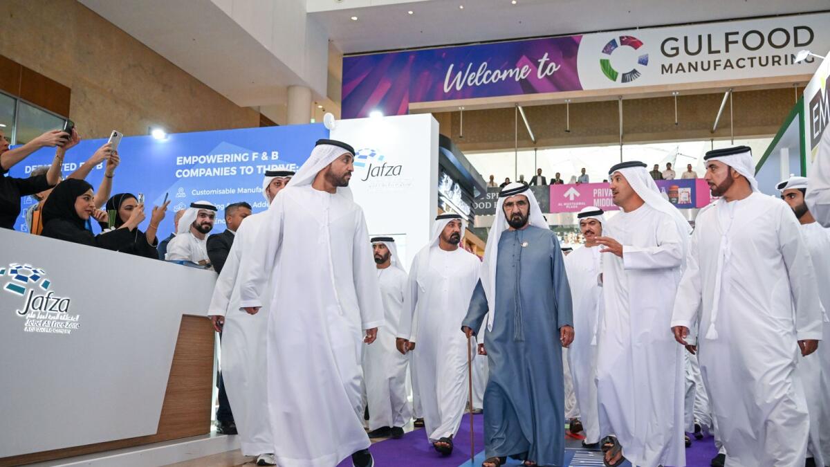 Sheikh Mohammed bin Rashid at Gulfood Manufacturing, accompanied by  Sheikh Ahmed bin Mohammed, Sheikh Ahmed bin Saeed and  Al Marri.
