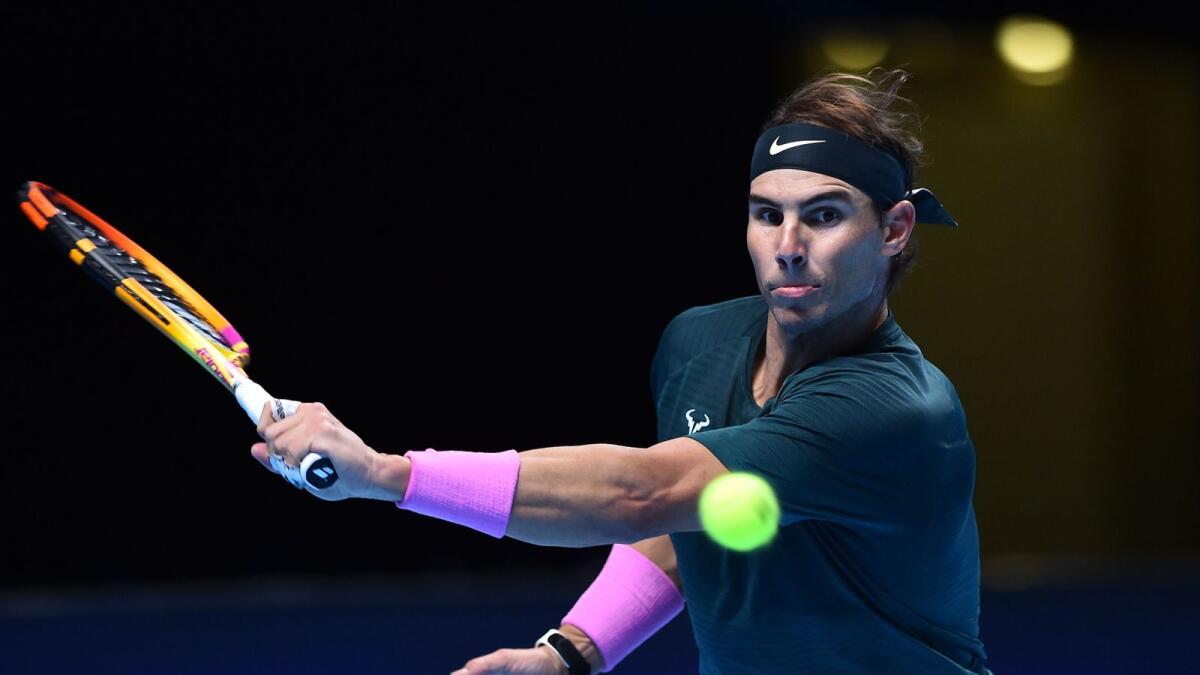 Spain's Rafael Nadal returns against Russia's Andrey Rublev in their men's singles round-robin match on day one of the ATP World Tour Finals. — AFP