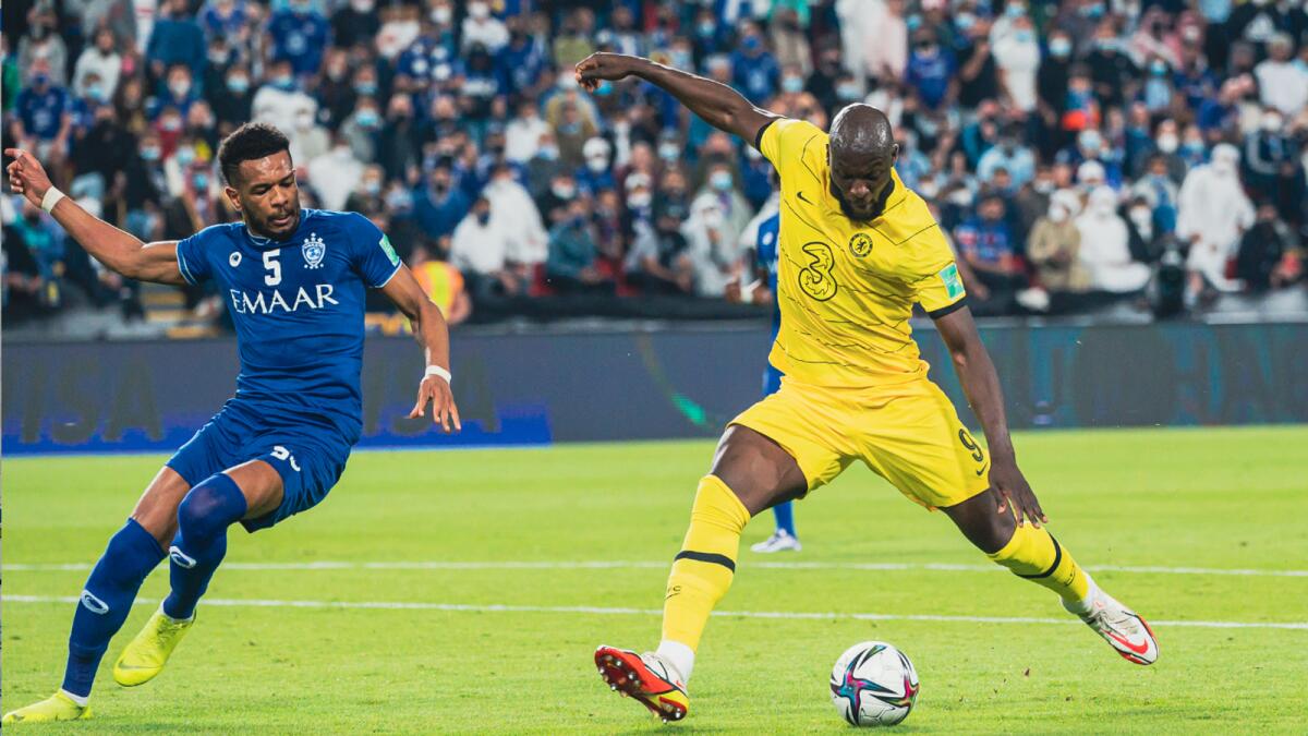Chelsea's Romelu Lukaku (right) shoots past Al Hilal's Ali Albulayhi during the Fifa Club World Cup semifinal in Abu Dhabi on Wednesday. — Neeraj Murali