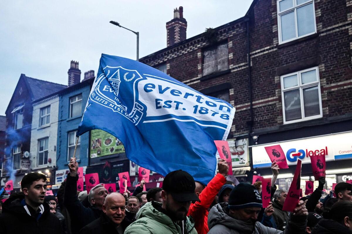 Everton's supporters protest over the club 10-point punishment for breaching financial regulation in the streets on November 26, 2023. — AFP file