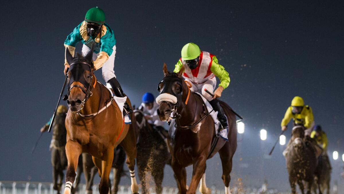 Firnas (left) wins the The Entisar at the Meydan Racecourse on Thursday night. — Dubai Racing Club