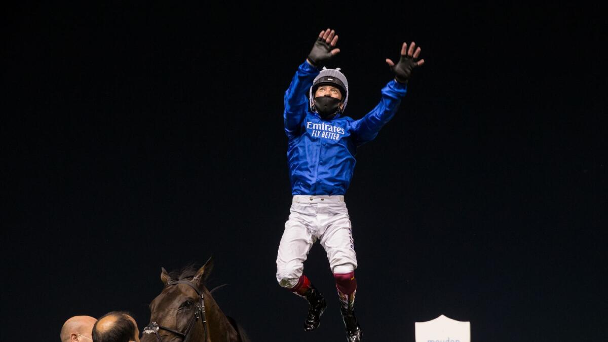 Frankie Dettori performs his trademark 'Flying Dismount' after guiding the Saeed bin Suroor-trained Volcanic Sky to victory in the Group 3 Nad Al Sheba Trophy at Meydan on Thursday night. — Dubai Racing Club