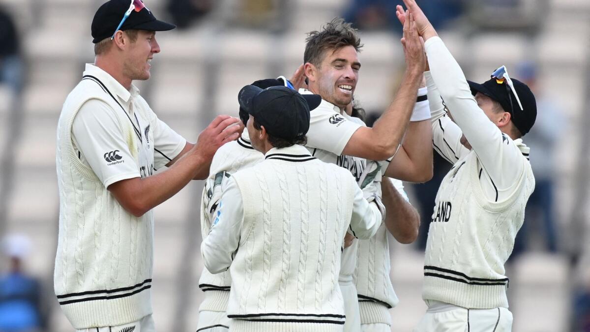 New Zealand's Tim Southee (centre) celebrates after dismissing India's Rohit Sharma (not in picture). (AFP)