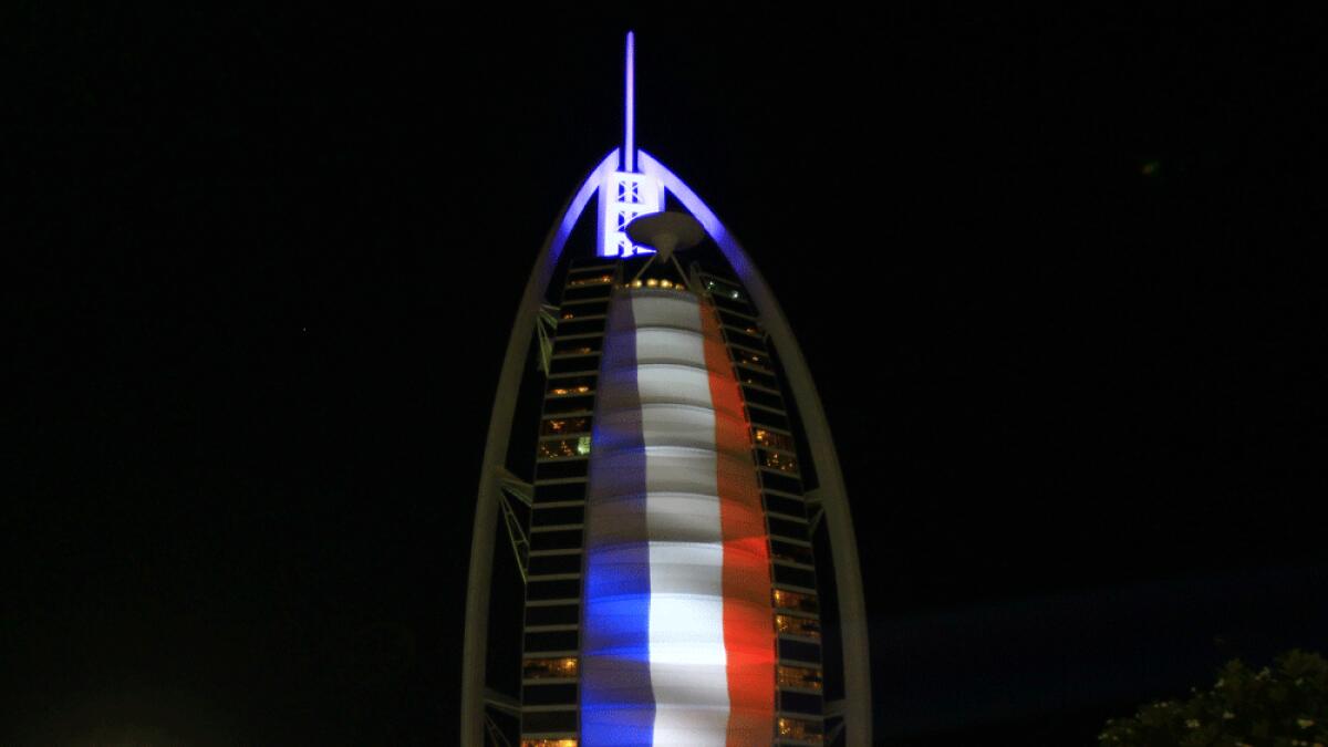 Burj Al Arab lit up with the colours of French flag.