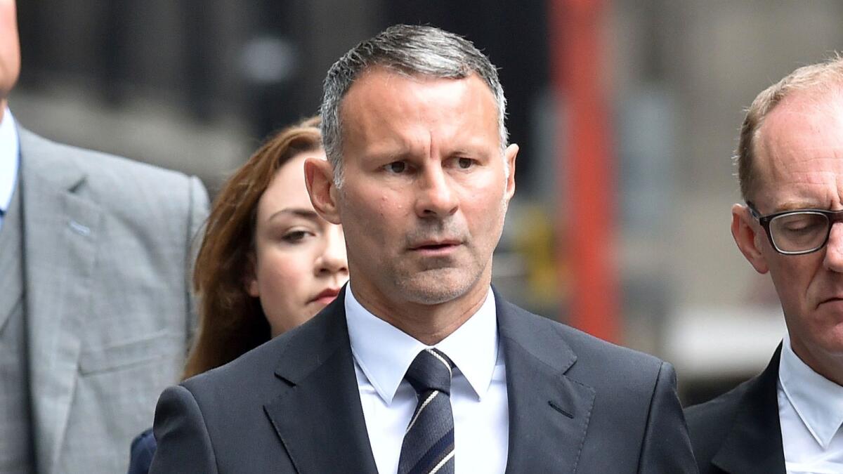 Former Manchester United footballer Ryan Giggs arrives at Manchester Crown Court. (AP)