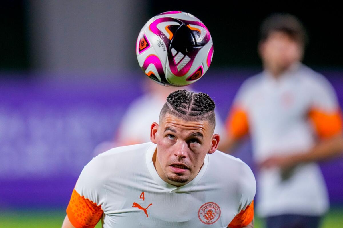 Manchester City's Kalvin Phillips heads the ball during a training session at the King Abdullah Sports City Stadium in Jeddah. — AP
