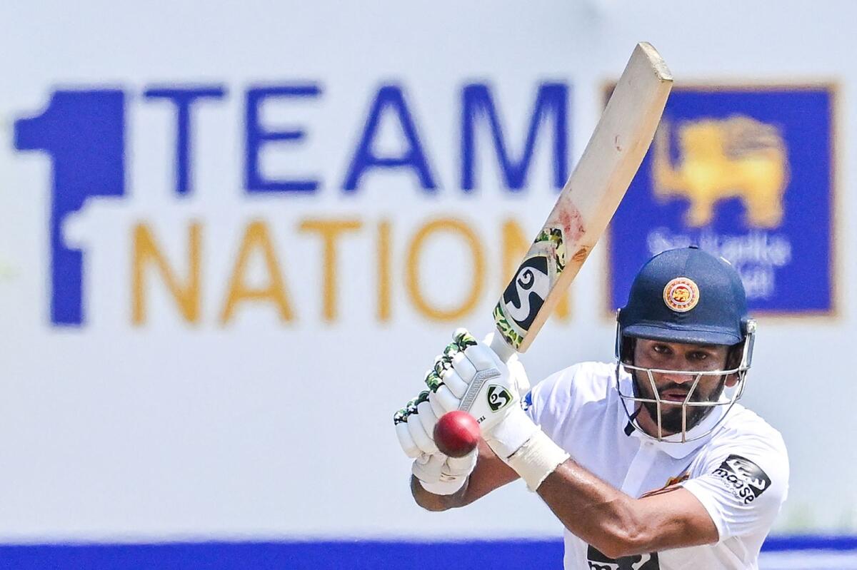 Sri Lanka's captain Dimuth Karunaratne plays a shot. — AFP