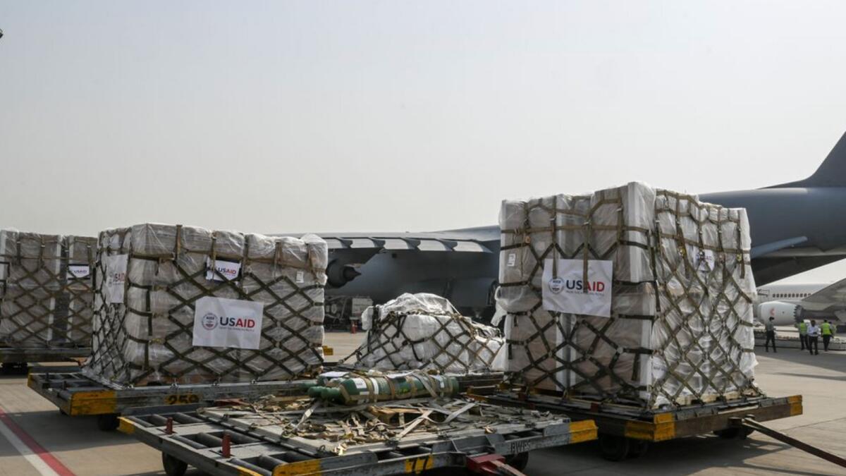 Covid relief supplies from the US being unloaded from a U.S. Air Force aircraft in New Delhi. Photo: Reuters