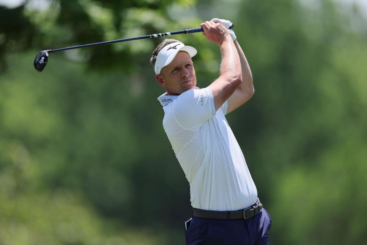 Luke Donald of England hits a tee shot on the fifth hole during the first round of the Memorial Tournament. — Supplied photo