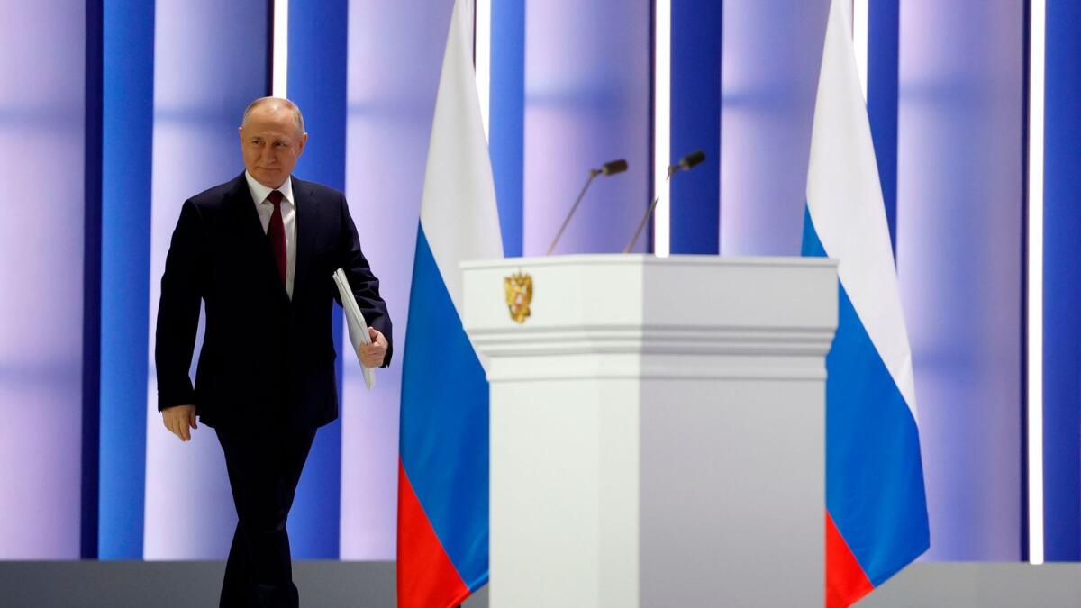 Russian President Vladimir Putin arrives to deliver his annual state of the nation address in Moscow on Tuesday. — AP