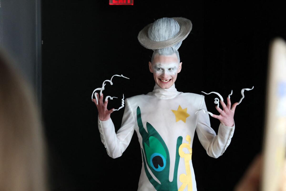 Model poses backstage at the Thom Browne fashion show during the February 2023 New York Fashion Week at The Shed on February 14, 2023 in New York City.