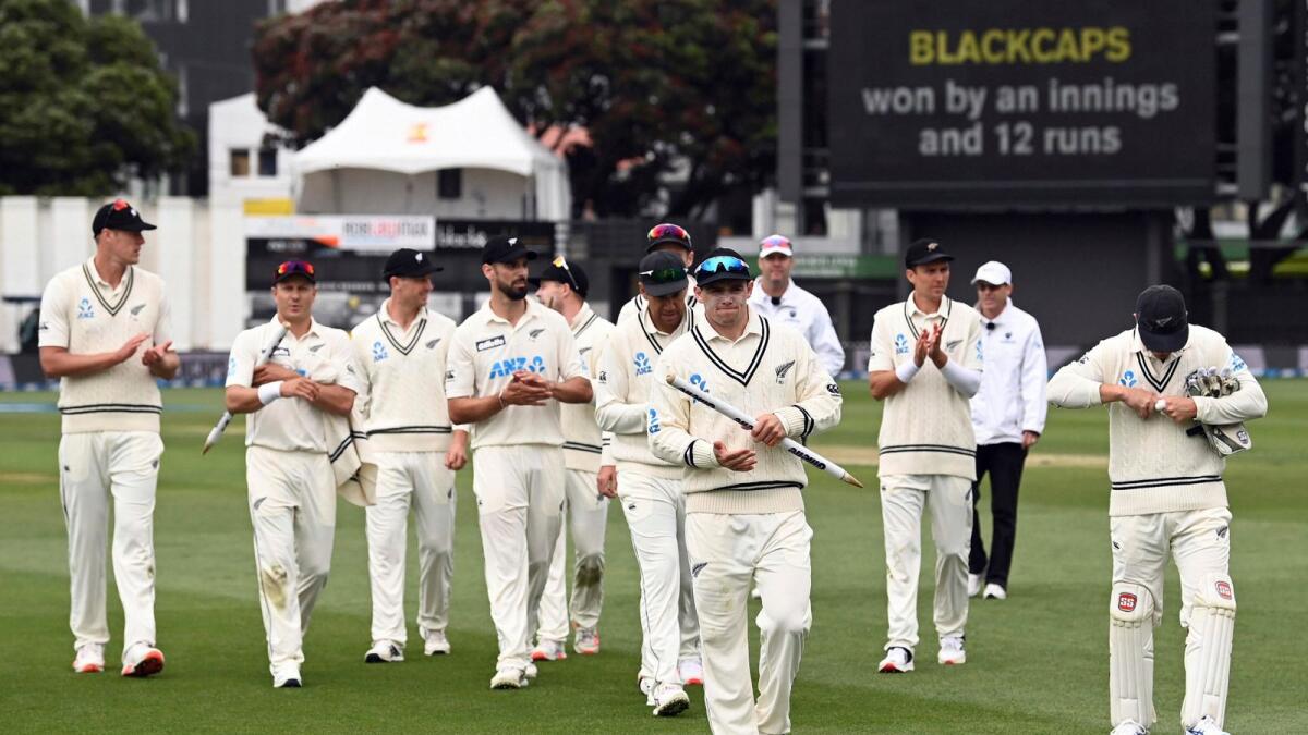New Zealand's captain Tom Latham (centre) leads his players off the ground after defeating the West Indies on the fourth day of their second cricket Tes. — AP