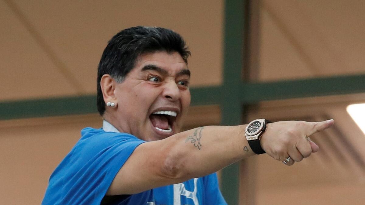 Maradona apologises over robbery comments
