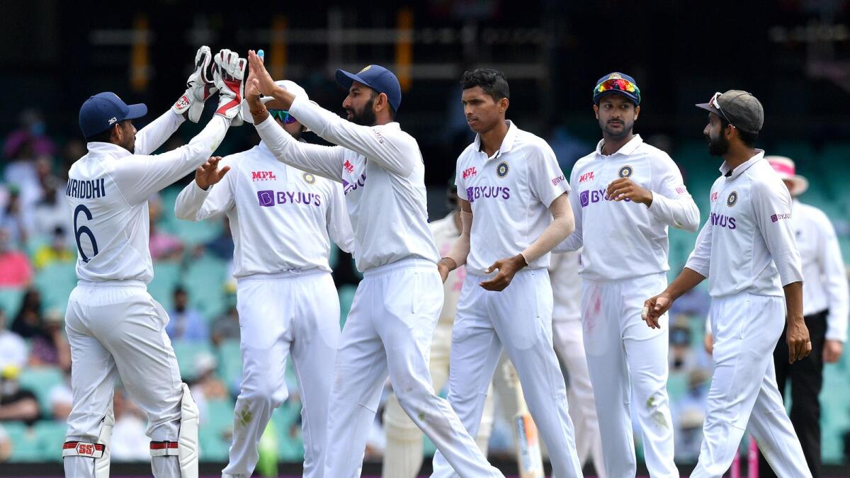 Indian players celebrate the dismissal of Australian batsman Marnus Labuschagne during day four of the third  Test match at the Sydney Cricket Ground. — AFP