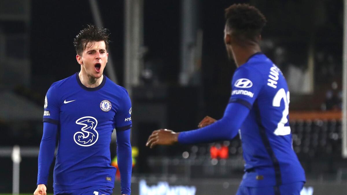 Chelsea's Mason Mount celebrates after scoring a goal against Fulham during the English Premier League match. — AP
