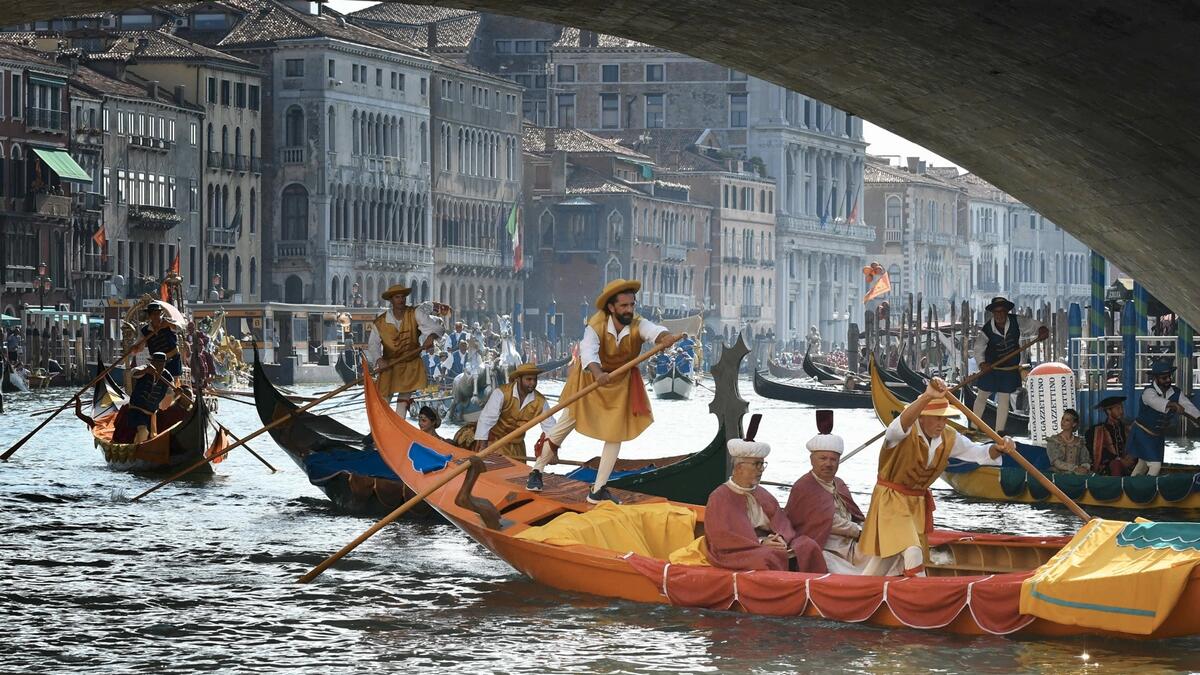 Rowers take part in the annual traditional gondolas and boats Historical Regatta (Regata Storica) on the Grand Canal in Venice during the Covid-19 infection, caused by the novel coronavirus.  Photo: AFP