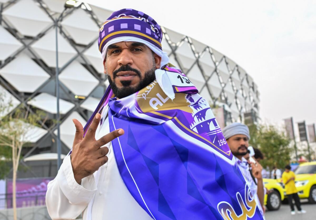 A football fan showing his support for Al Ain. — Photo by Muhammad Sajjad