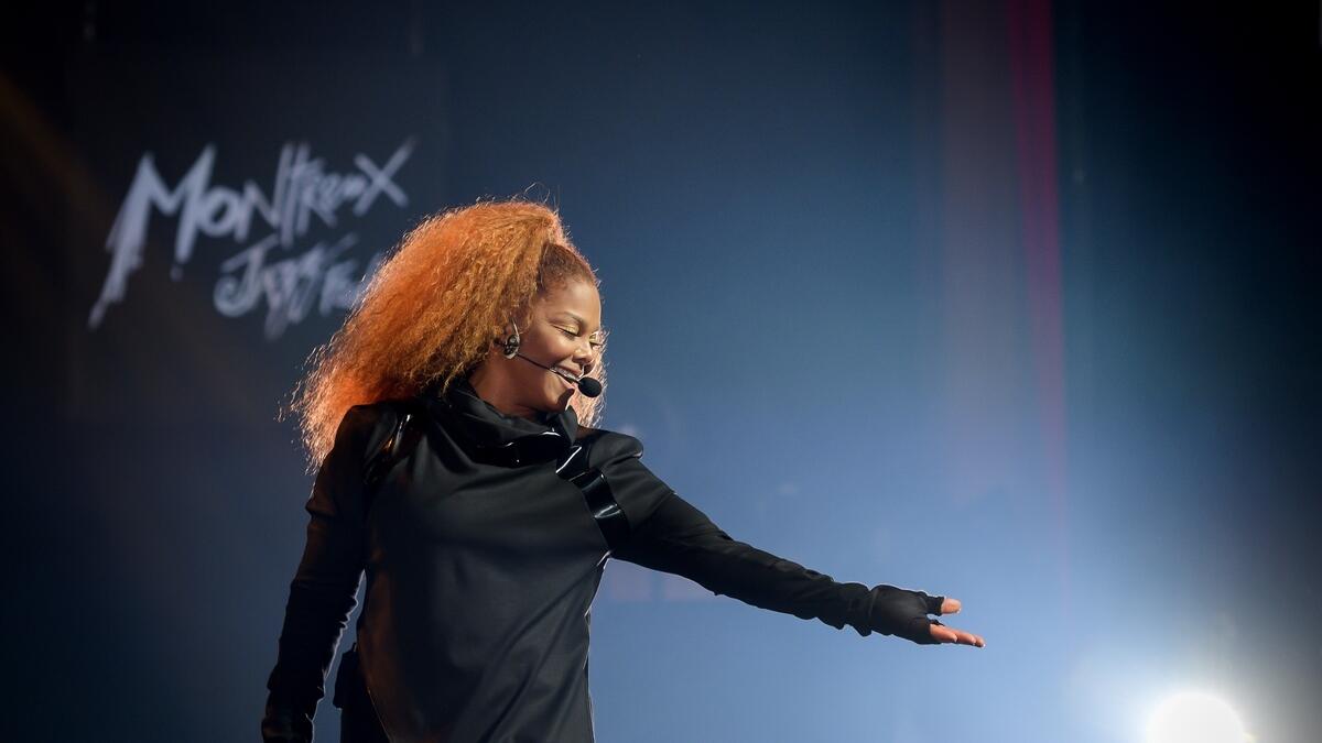 Janet Jackson performs on stage.- AFP