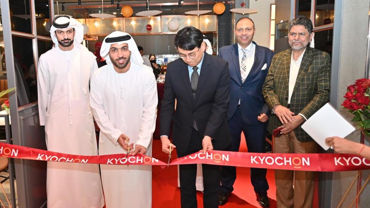 Mohammed Galadari, Co-chairman of Galadari Brothers; Moon Byung-Jun, Consul-General of the Republic of Korea; Ahmed Osman, Chief Executive Officer of Galadari Food and Beverage Division; and Mohamed Yahya Kazi Meeran, Director and Group CEO of Galadari Brothers, at the opening of the first KyoChon restaurant in City Centre Deira