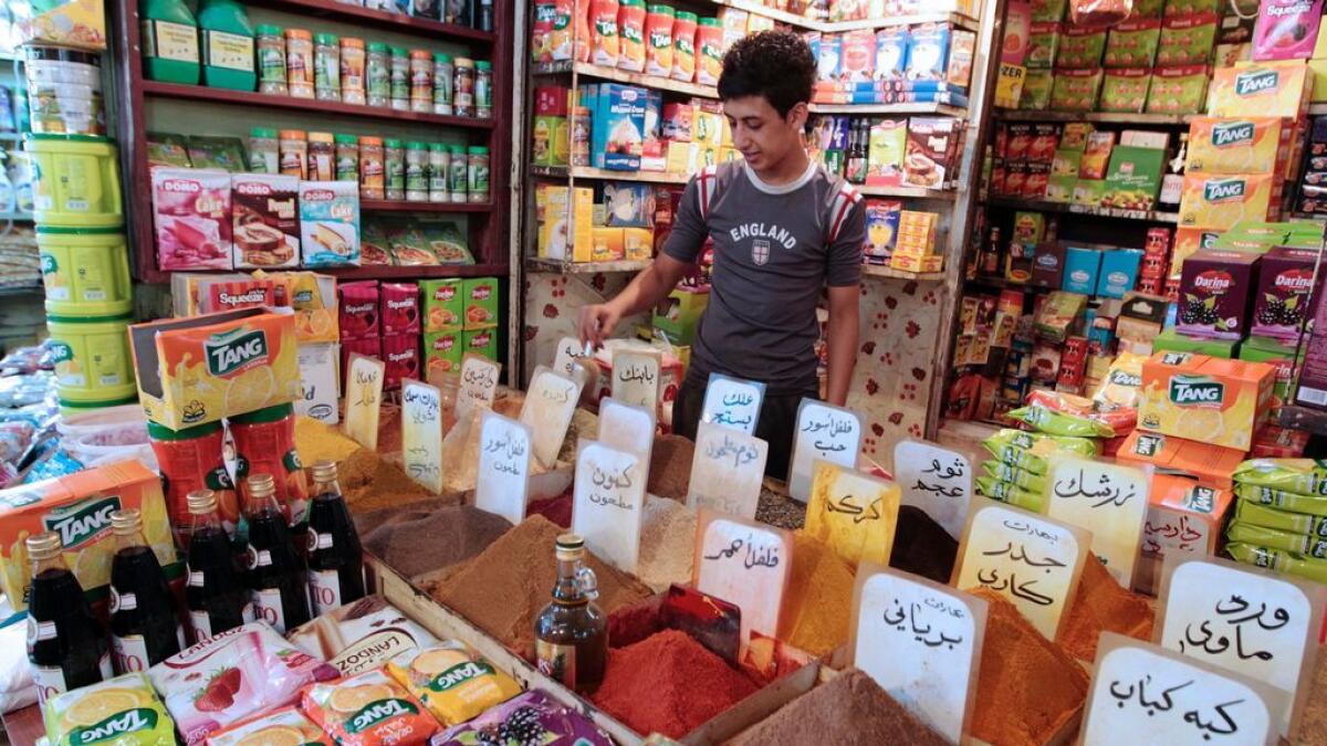 An Iraqi vendor sells spices at Shorja market in central Baghdad as people prepare for the holy month of Ramadan due to start this week.
