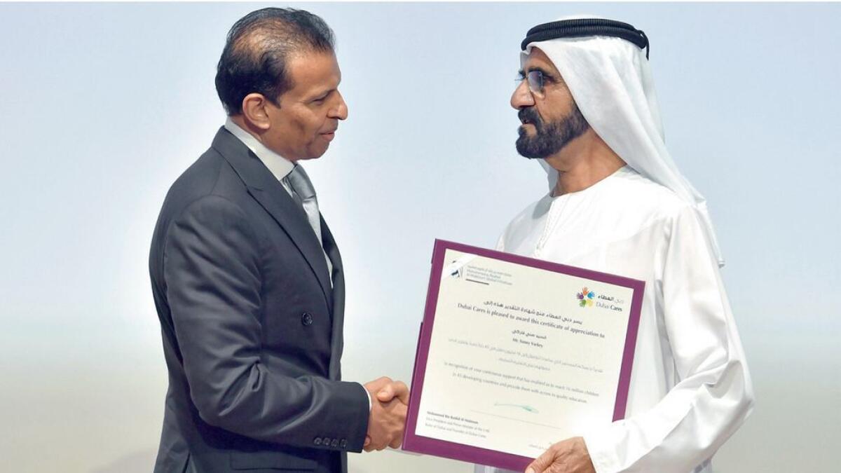 Sheikh Mohammed congratulates founder and chairman of GEMS Education Sunny Varkey for his contribution to Dubai Cares.