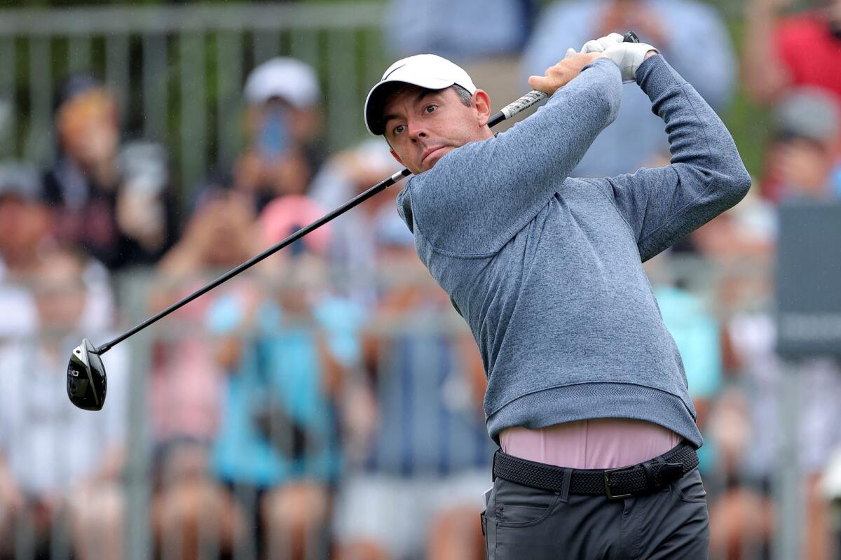 Rory McIlroy of Northern Ireland hits a tee shot on the first hole during the third round of the Valero Texas Open. — Reuters