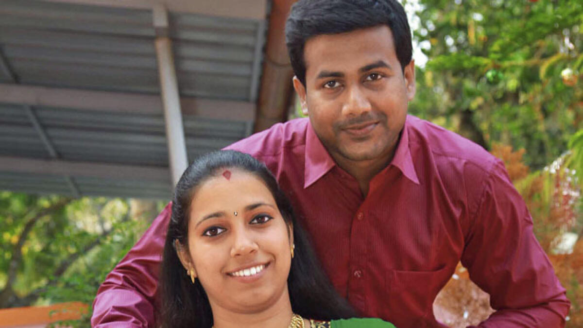 FOR A GOOD CAUSE: Deepika Satheesh Naik with her husband, who shaved his hair in support, after she decided to donate all of hers