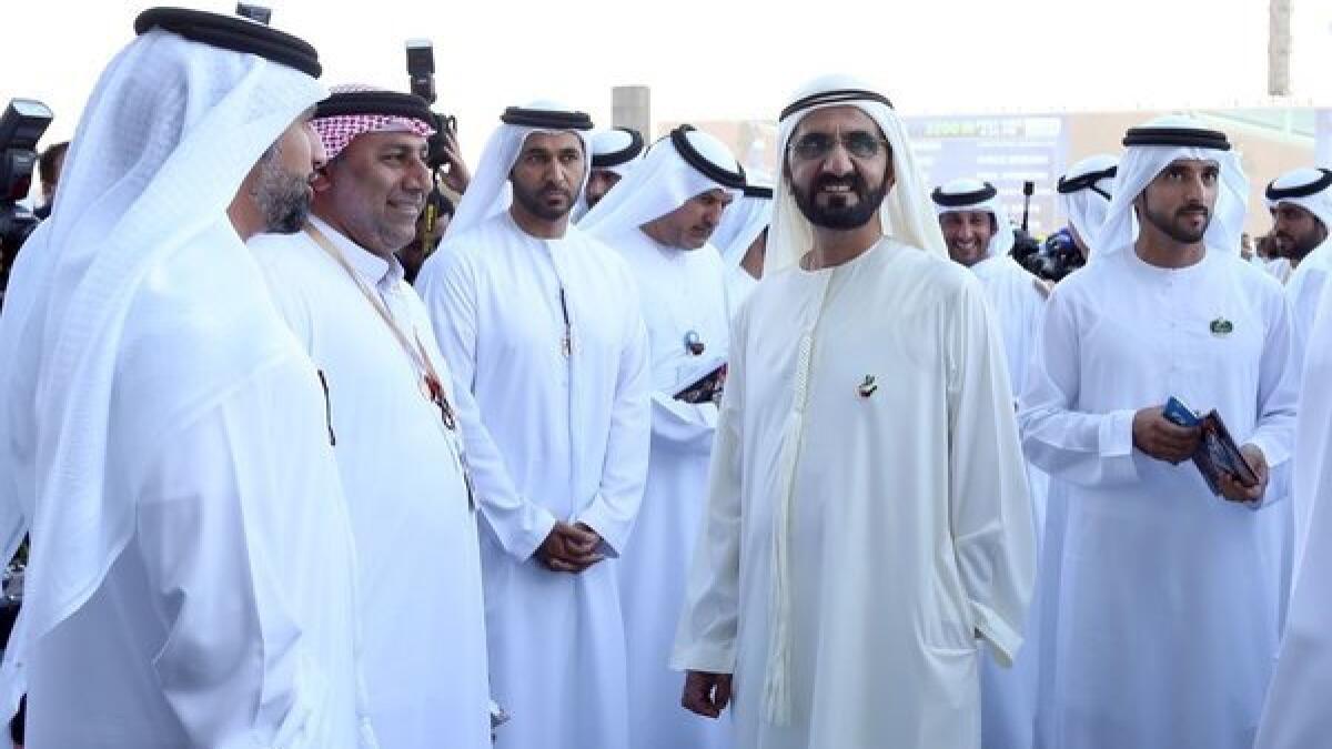 HH Shaikh Mohammed bin Rashid Al Maktoum and son, Shaikh Hamdan, Crown Prince of Dubai, arrive at Meydan racecourse for the Dubai World Cup.