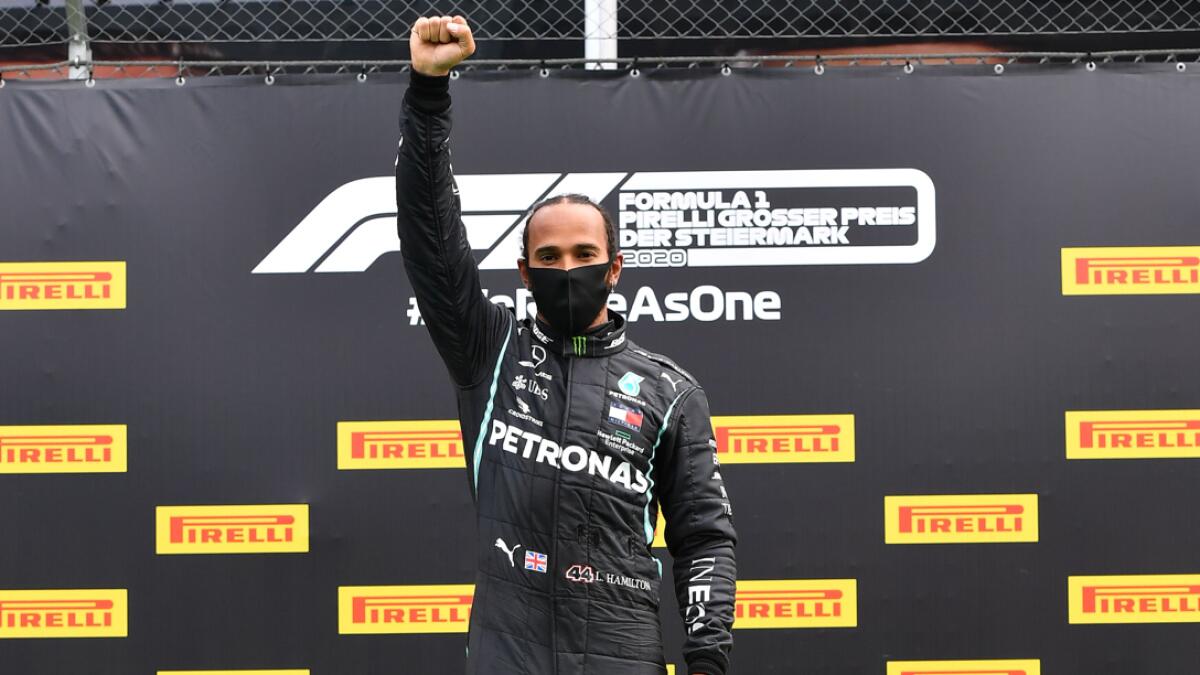 British driver Lewis Hamilton celebrates on the podium after winning the Formula One Styrian Grand Prix race on July 12, 2020 in Spielberg, Austria. Photo: AFP
