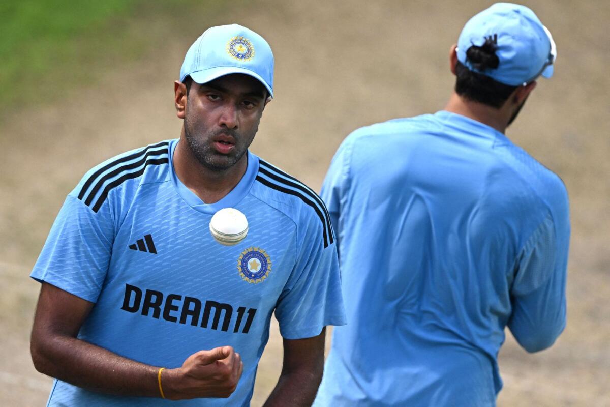 India's Ravichandran Ashwin (L) takes part in a practice session at the Punjab Cricket Association I.S. Bindra stadium in Mohali on September 21, 2023. Photo: AFP